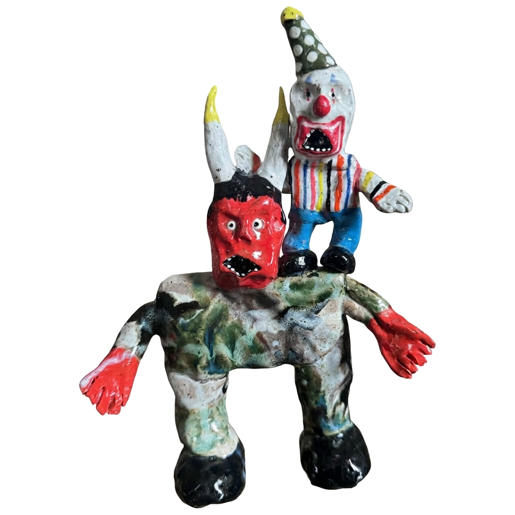 Ceramic creature with clown rider
