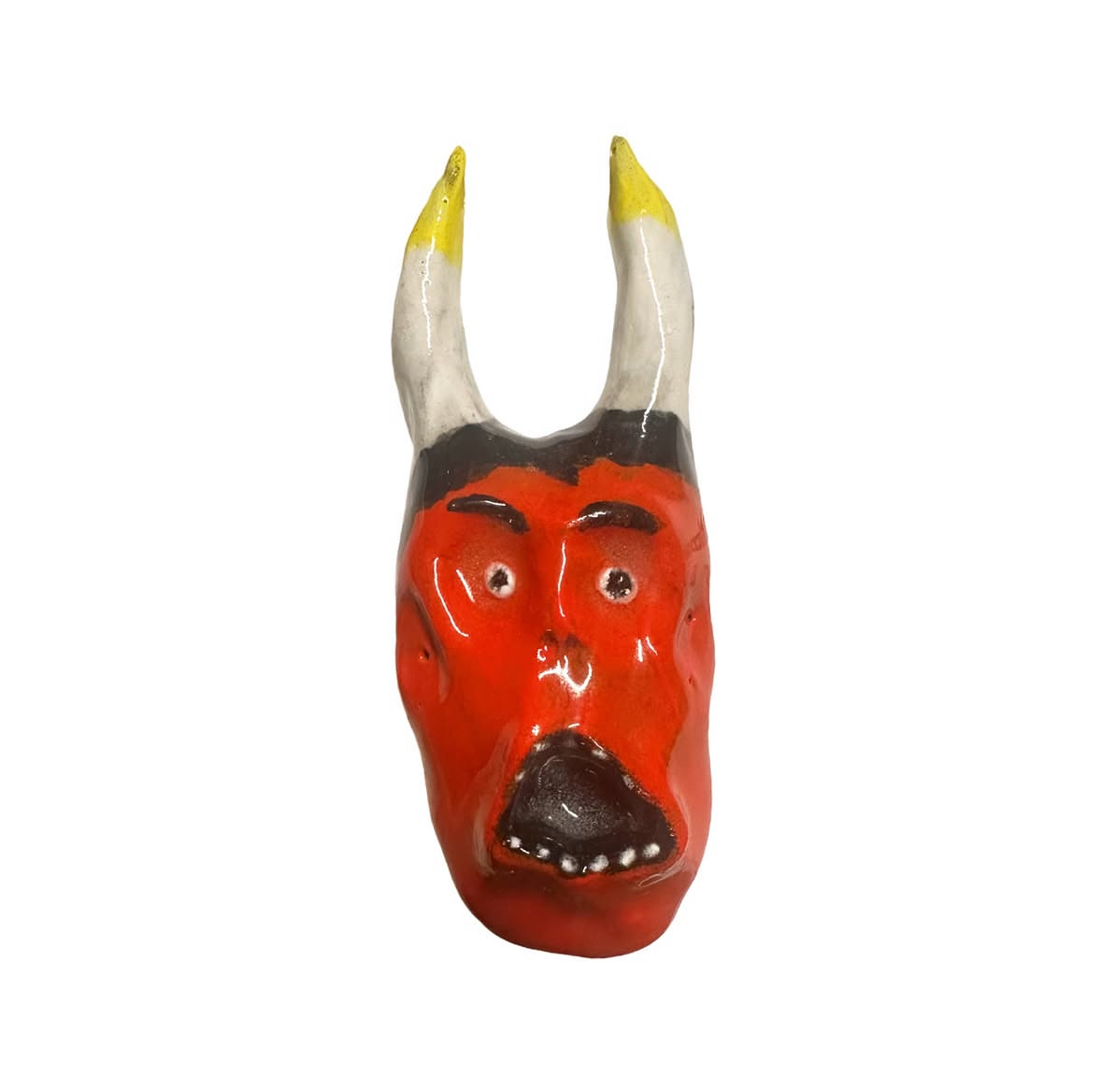 Ceramic red devil head with yellow-tipped horns