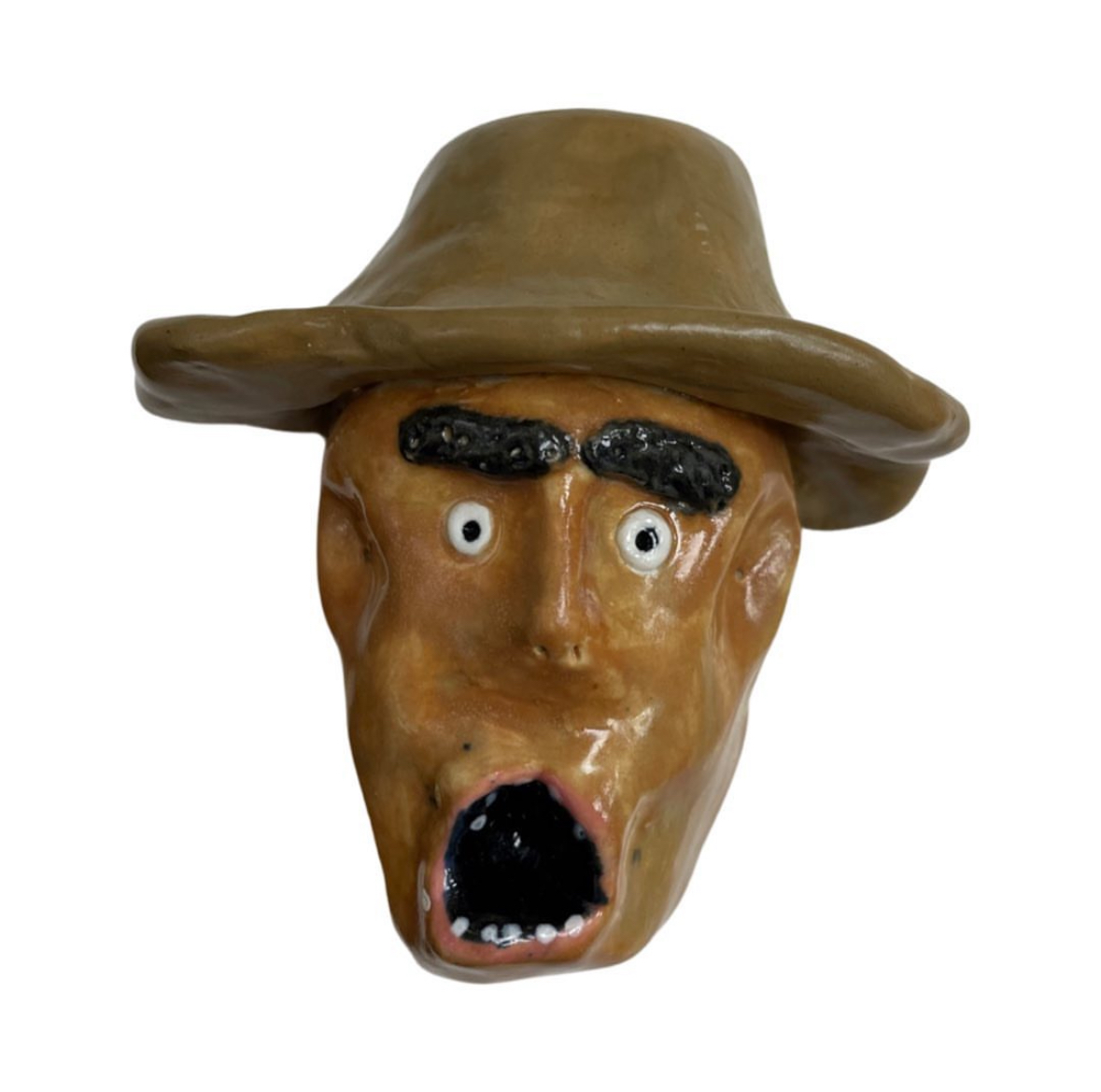Ceramic head with tan hat and screaming open mouth
