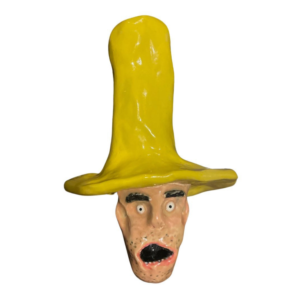 Ceramic head with tall yellow stovepipe hat