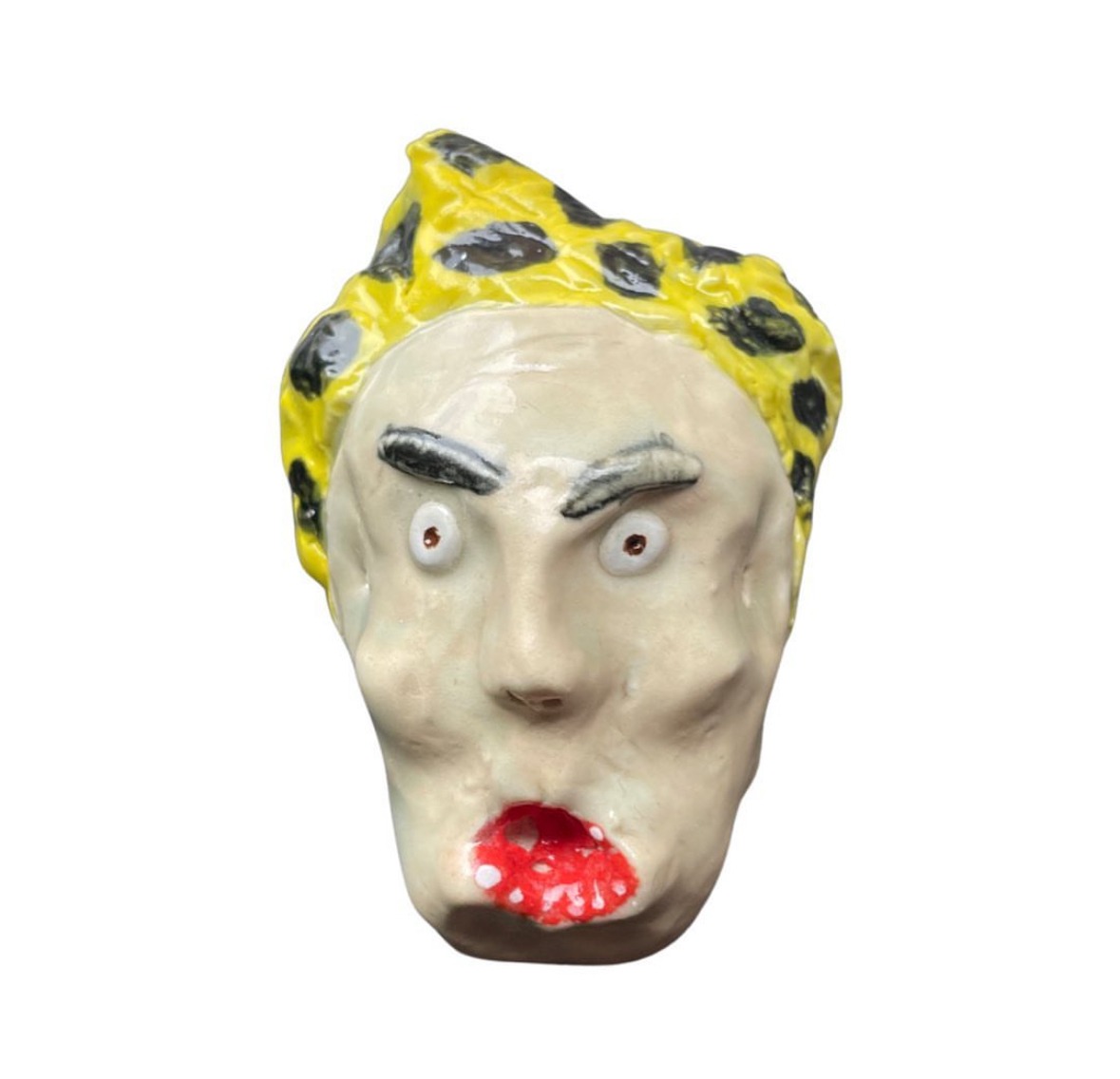 Ceramic head with yellow and black leopard-print hat