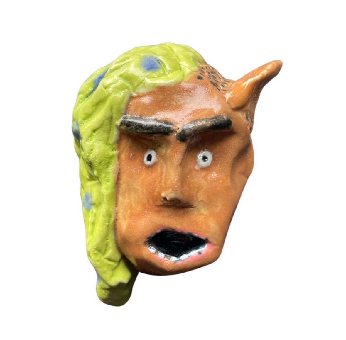 Ceramic head with green hair and pointed ear