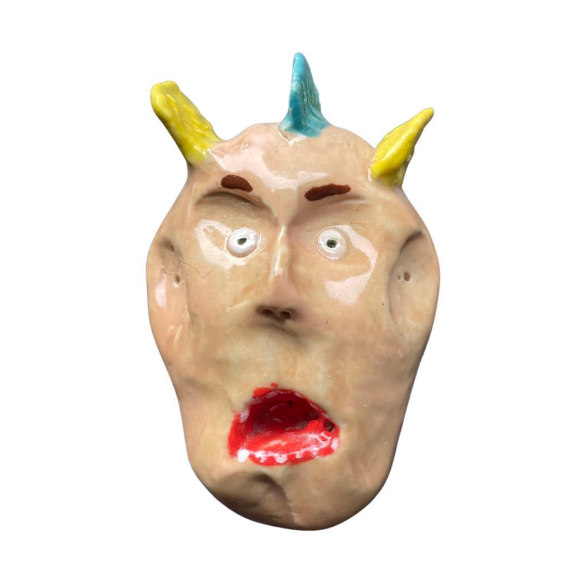 Ceramic head with yellow and blue horns