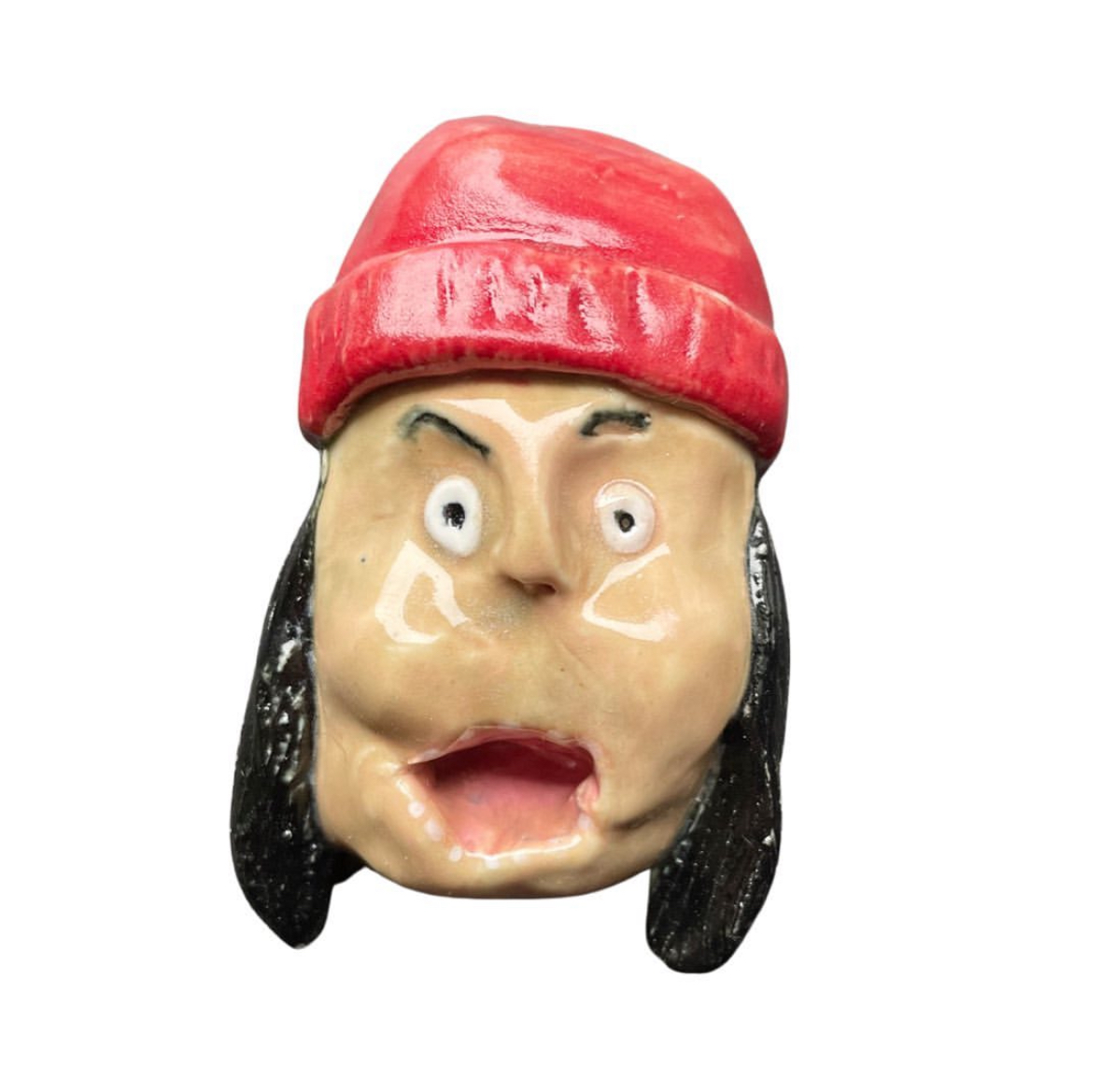 Ceramic head with red beanie and long black hair
