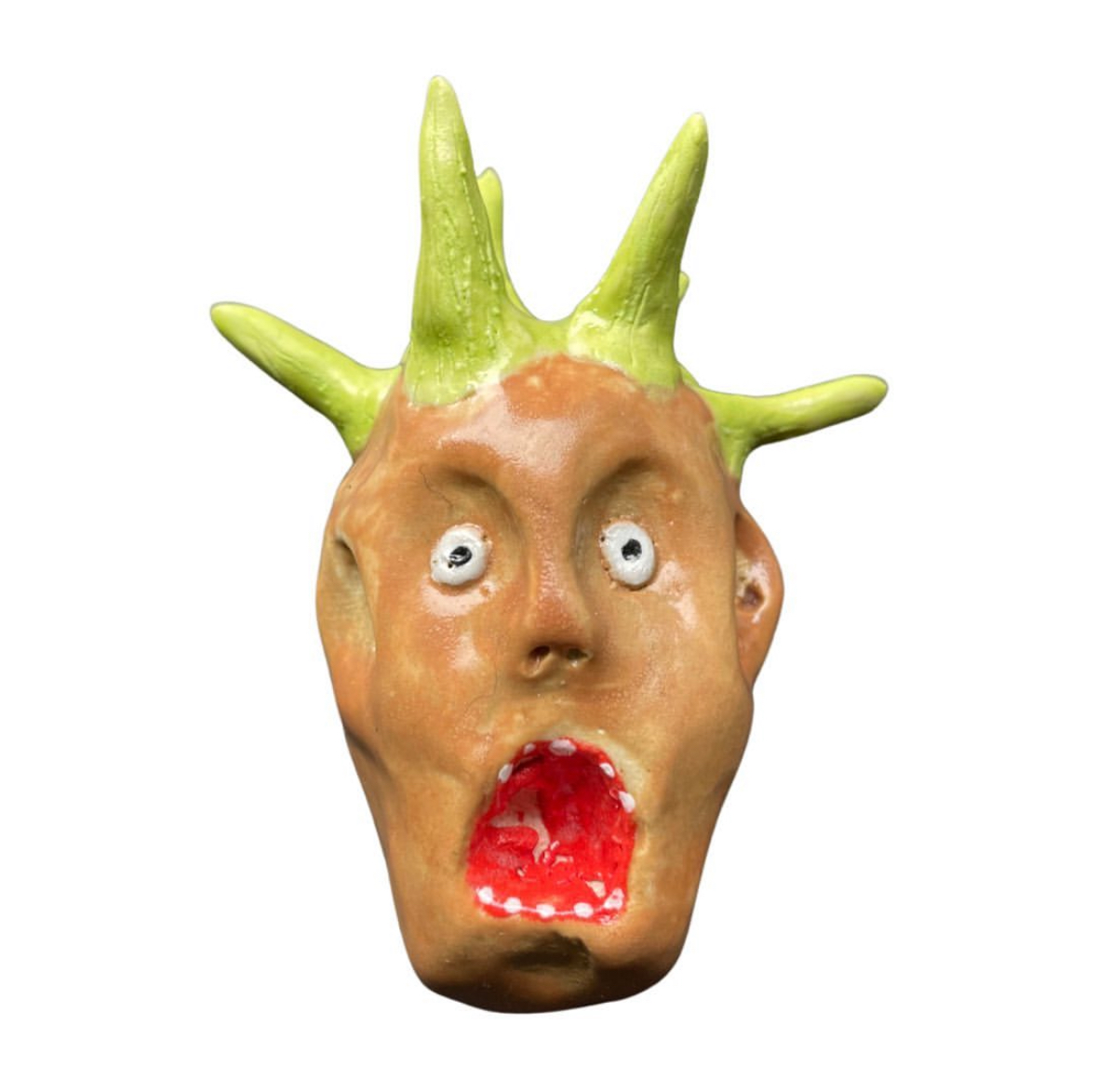 Ceramic head with green spikes and screaming mouth