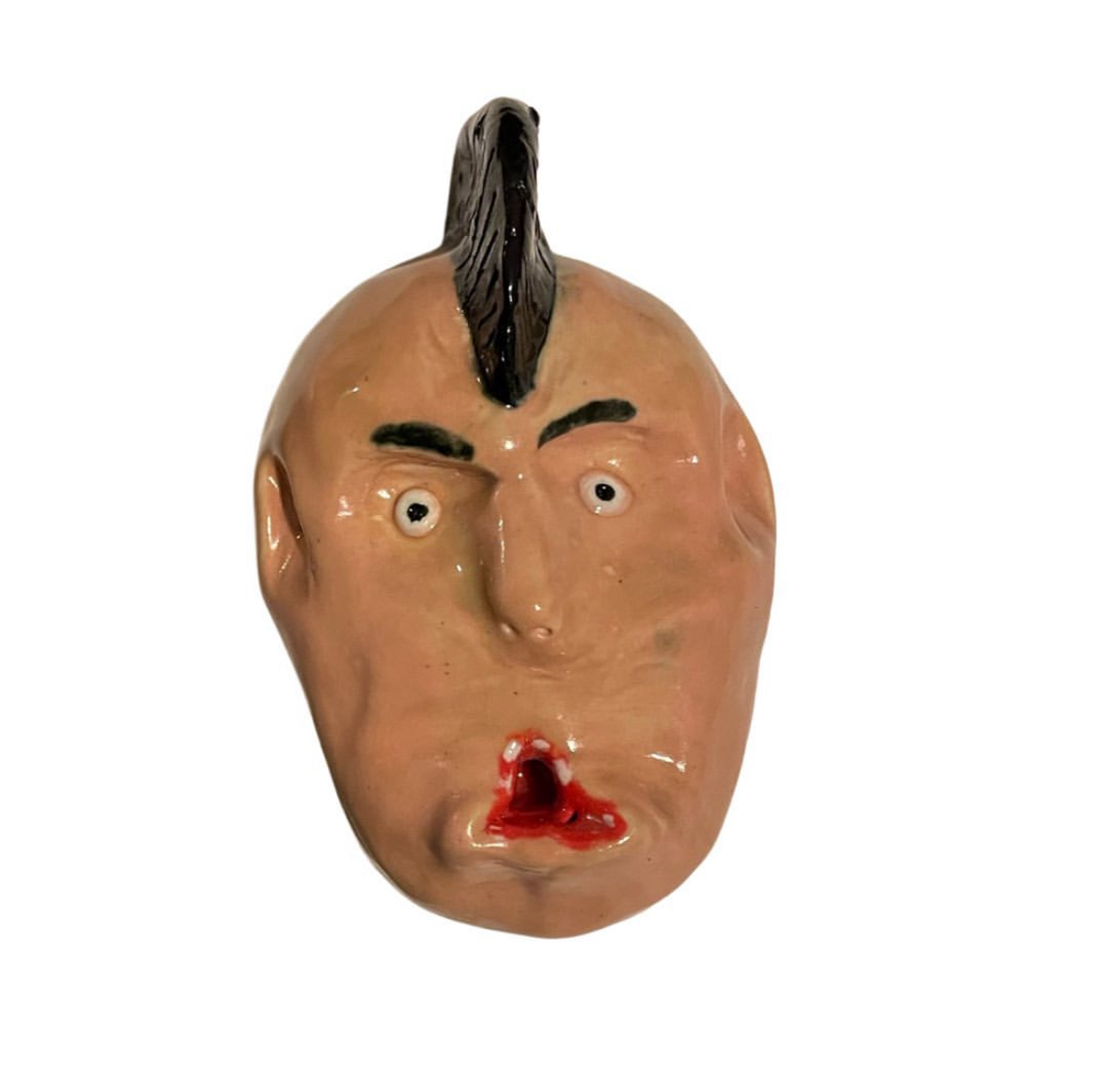 Ceramic mohawk head with pursed lips