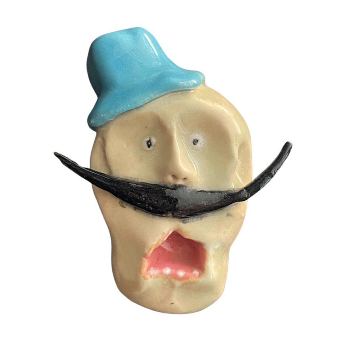Ceramic head with blue cap and large black mustache