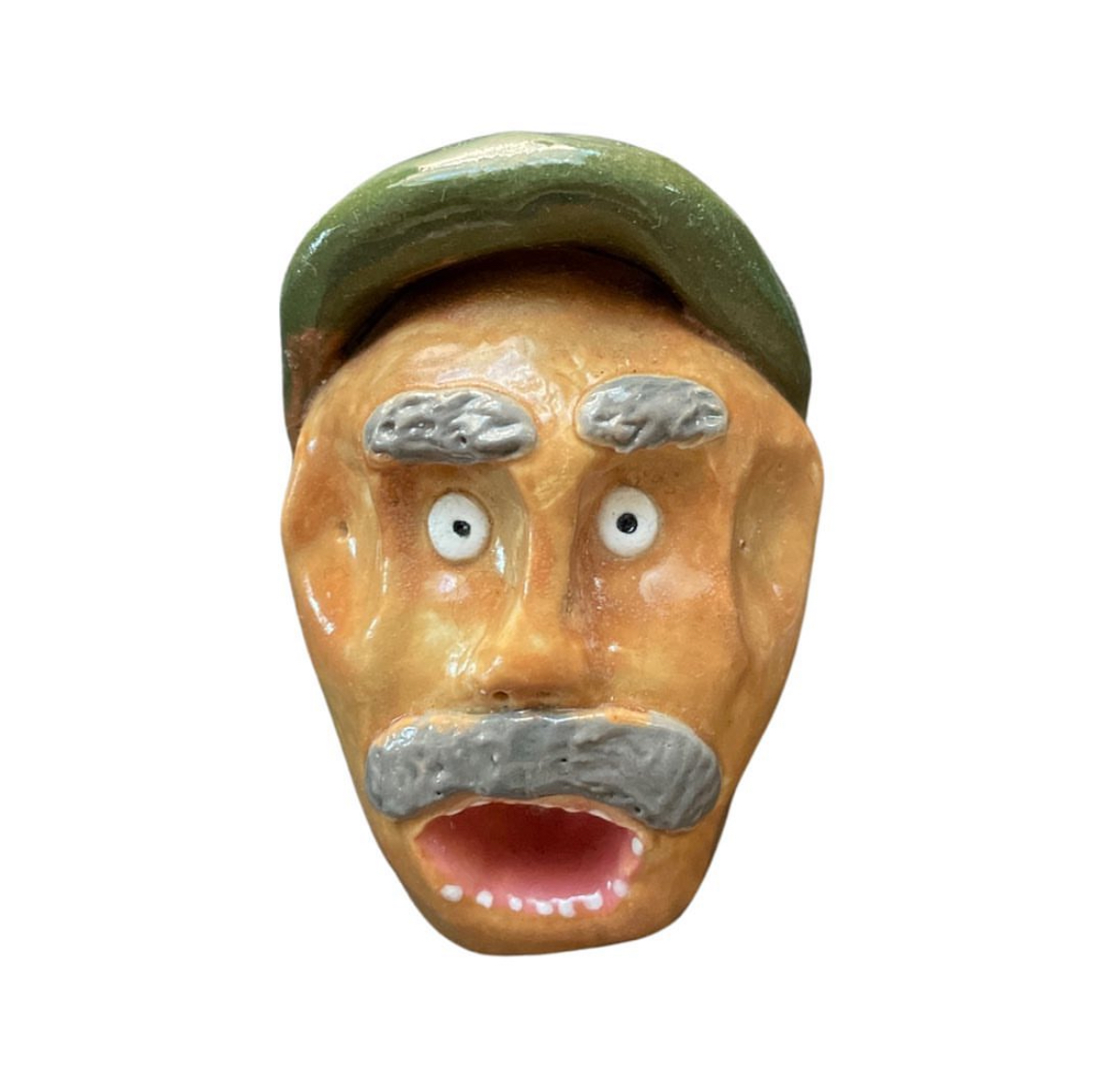 Ceramic head with green cap and gray mustache
