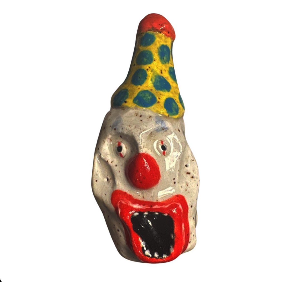 Ceramic clown head with yellow and blue polka-dot party hat