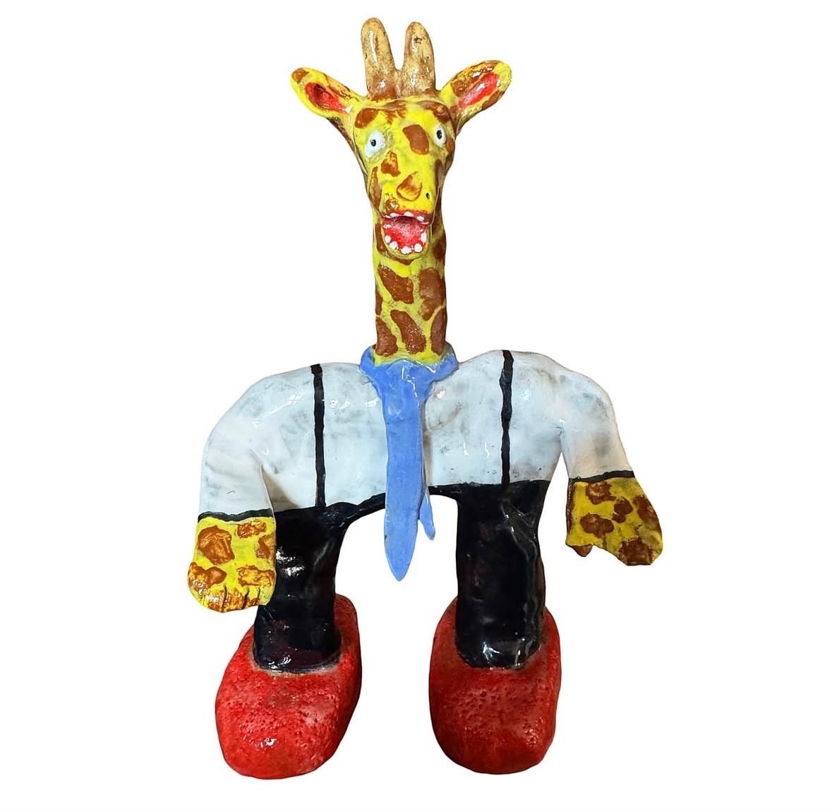 Ceramic giraffe figure in white shirt, blue tie and red shoes