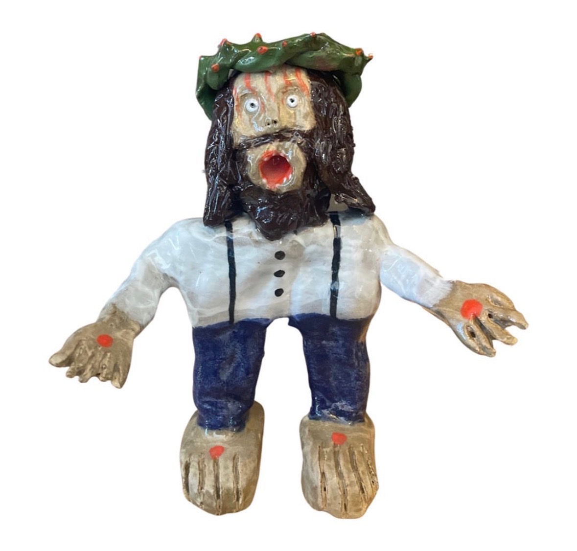 Ceramic Jesus figure with crown of thorns, white shirt and blue pants