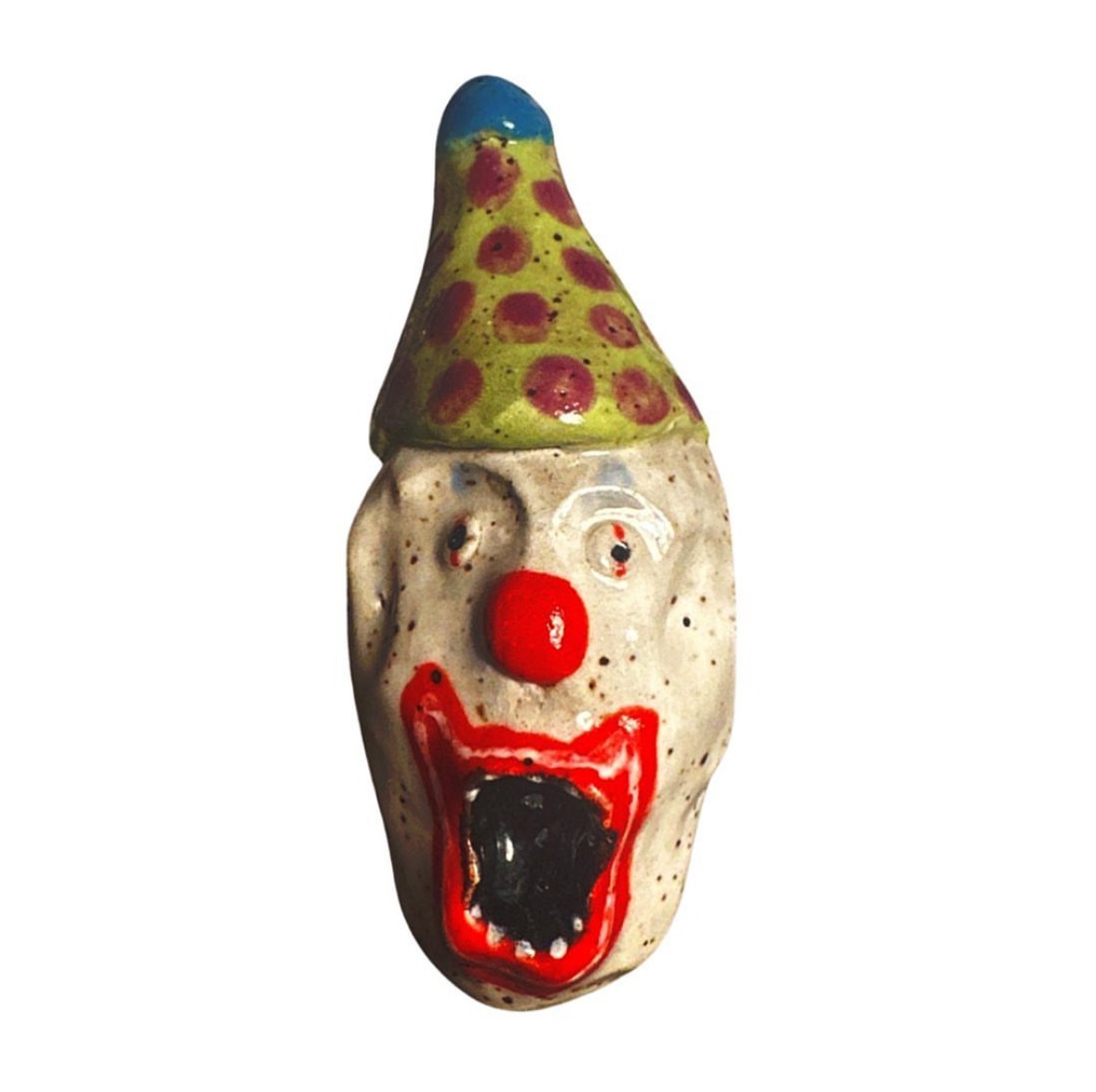 Ceramic clown head with green and red polka-dot party hat