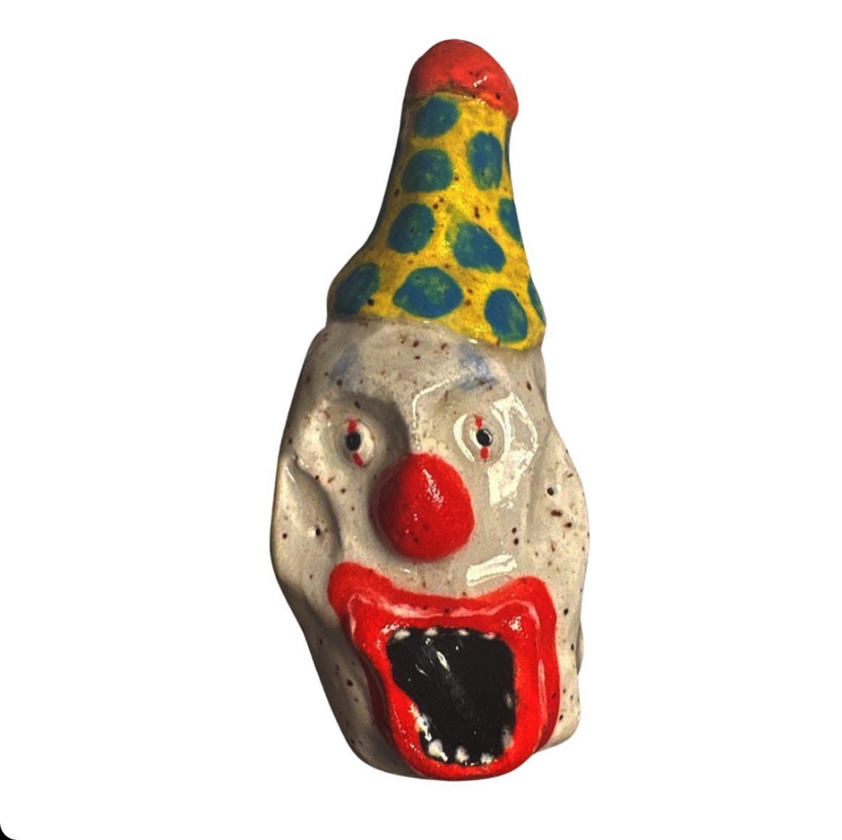 Ceramic clown head with yellow and blue polka-dot party hat
