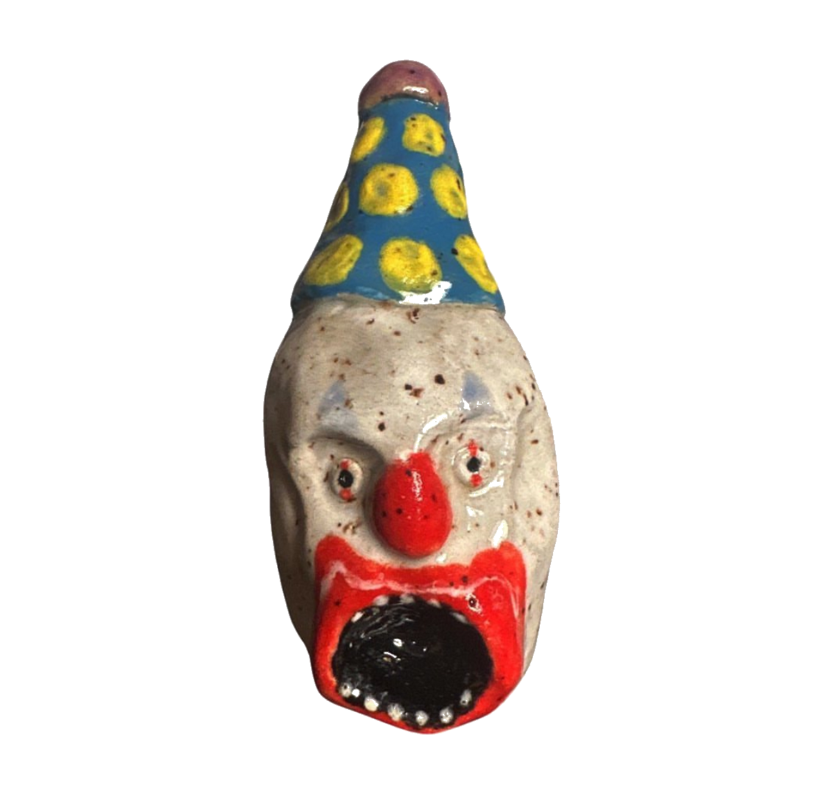 Ceramic clown head with blue and yellow polka-dot party hat