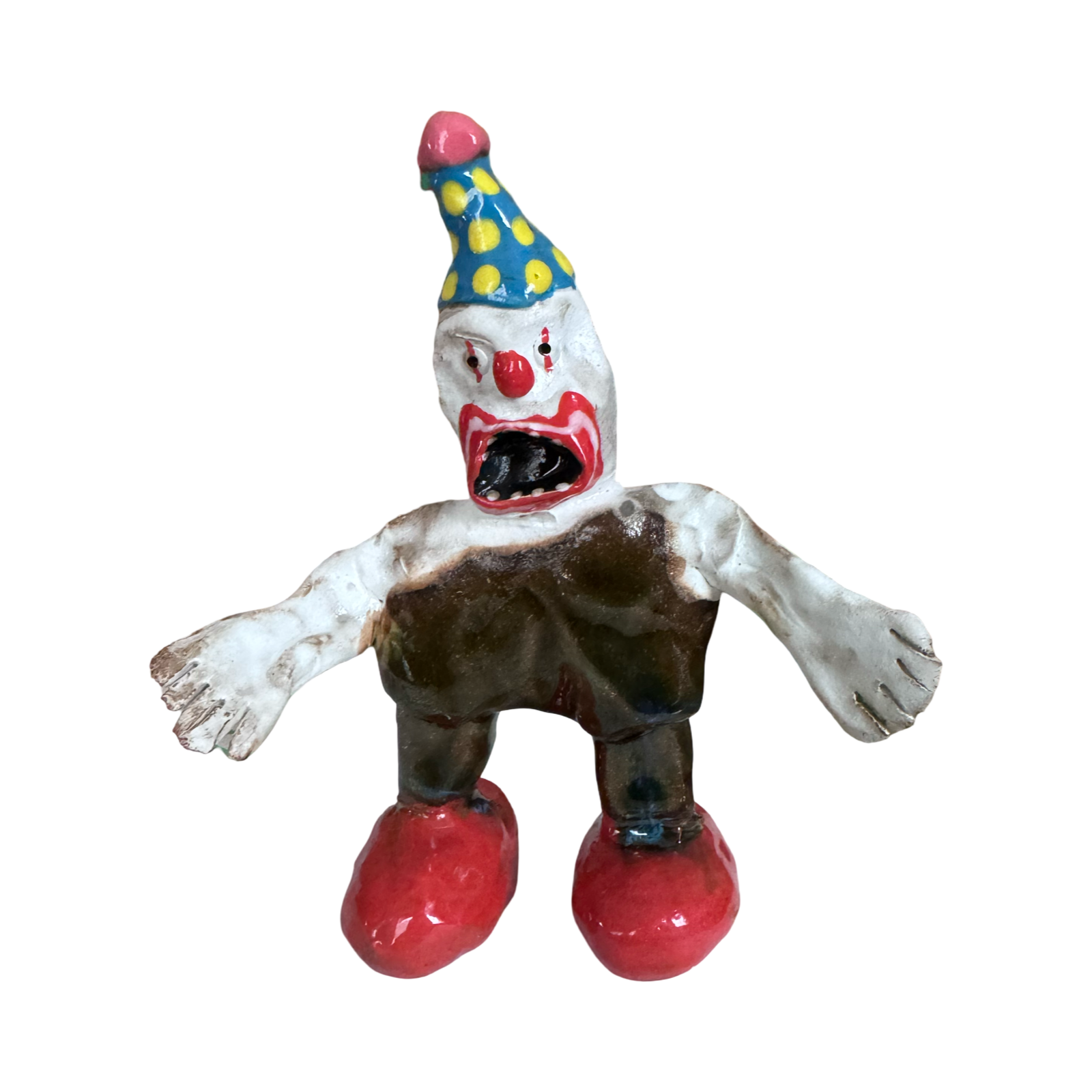 Ceramic clown figure with red boots