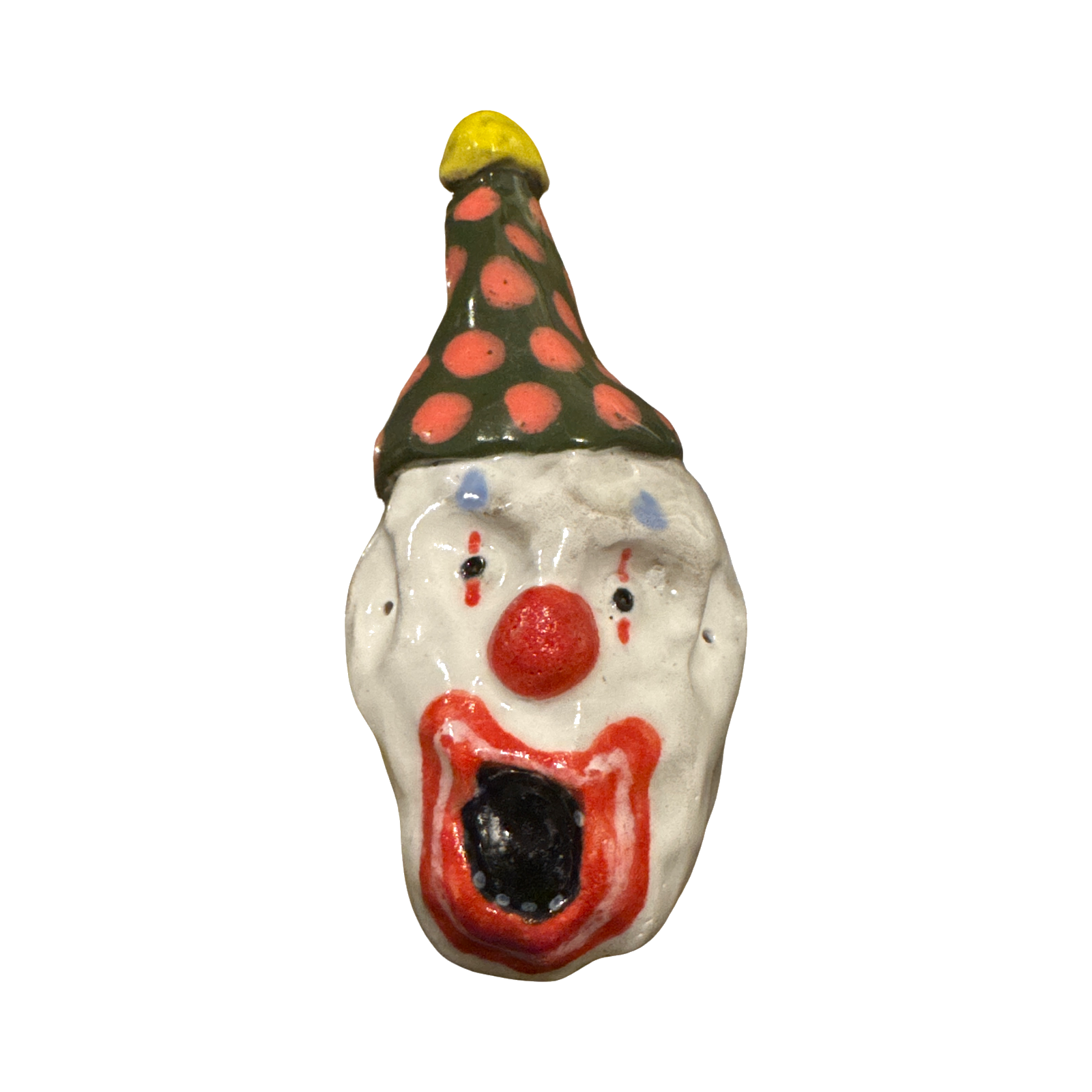 Ceramic clown head with green polka-dot party hat