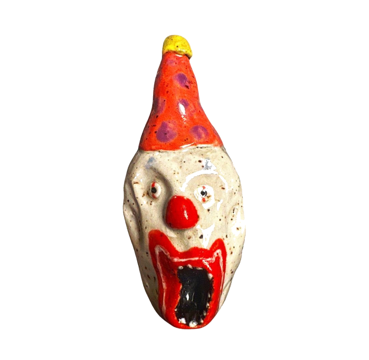 Ceramic clown head with orange and purple polka-dot party hat