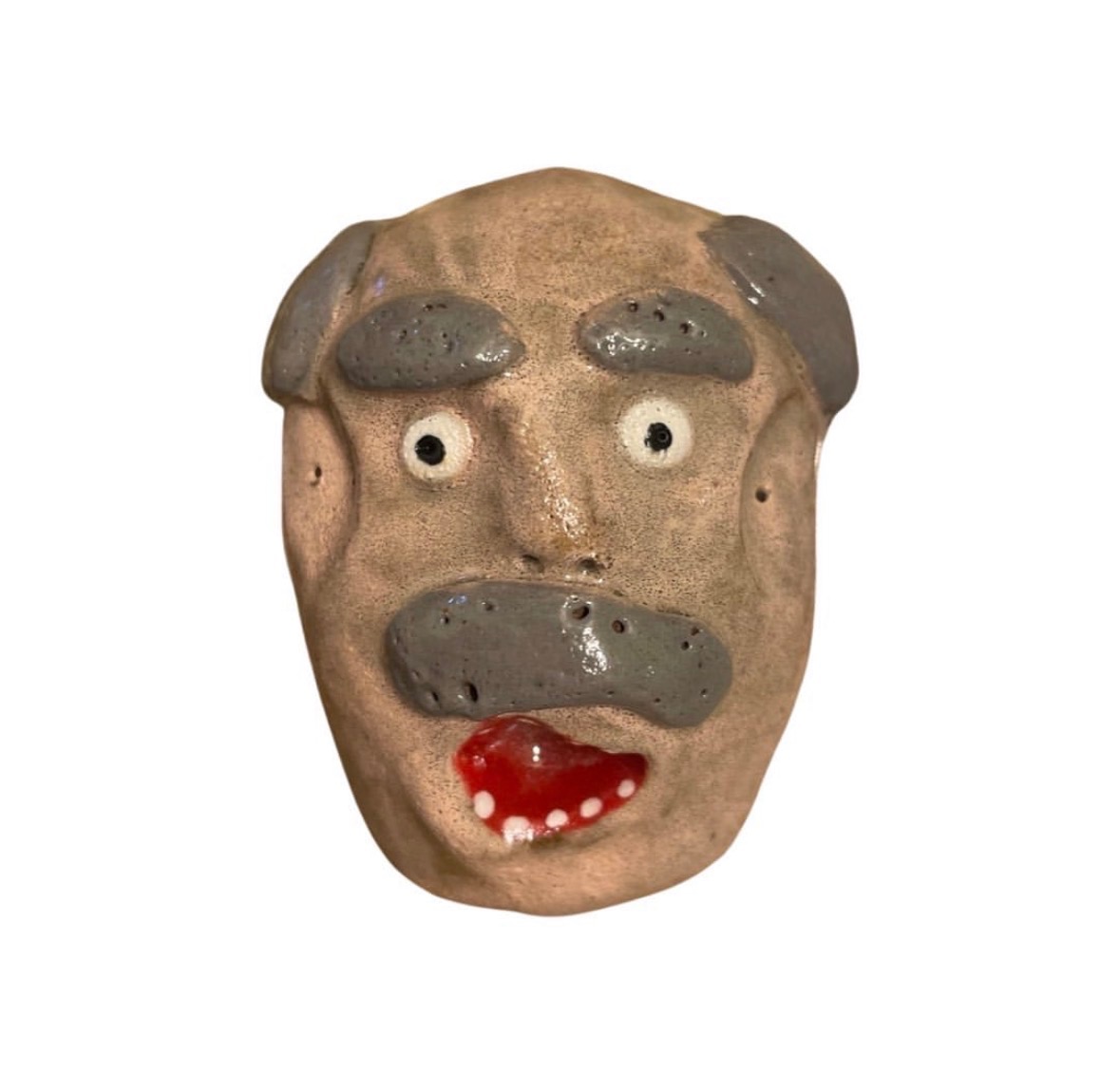 Ceramic tan head with gray eyebrows, gray mustache and red mouth