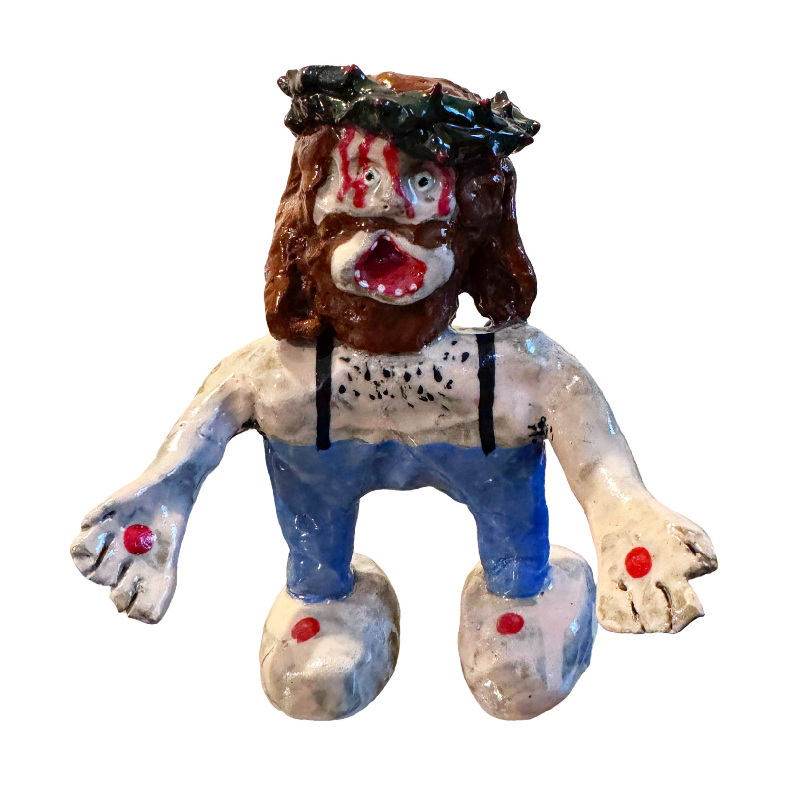 Ceramic Jesus figure with crown of thorns and overalls