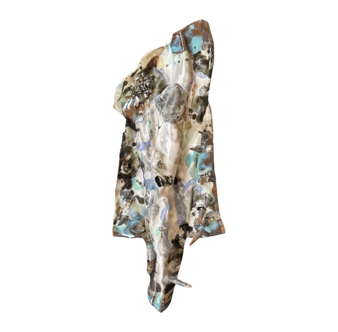 Ceramic ridge sculpture top-down view with abstract glaze pattern